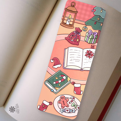 Cozy Christmas Tree bookmark in an open book, cozy reading