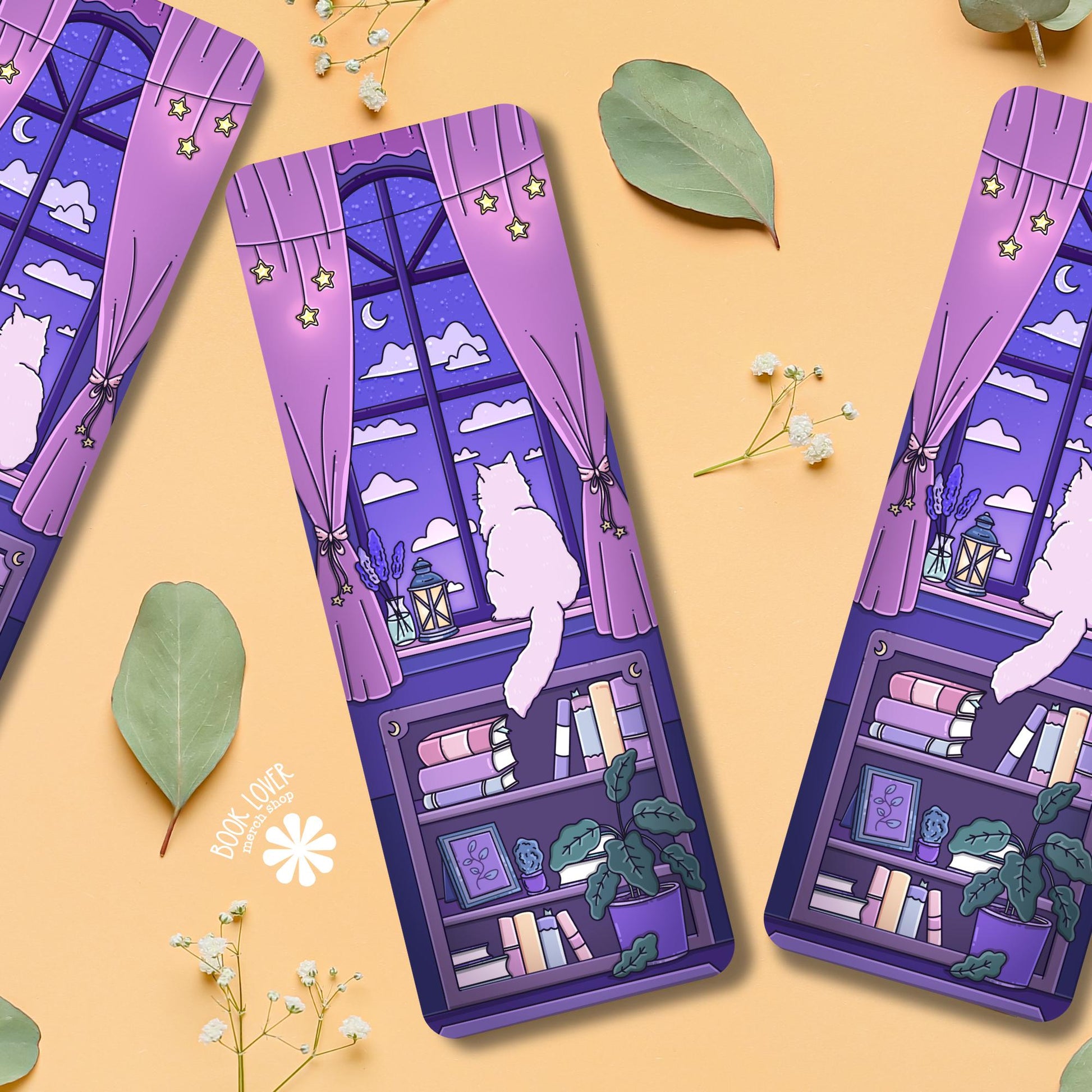 Three purple cat bookmarks with white cat and bookshelf design