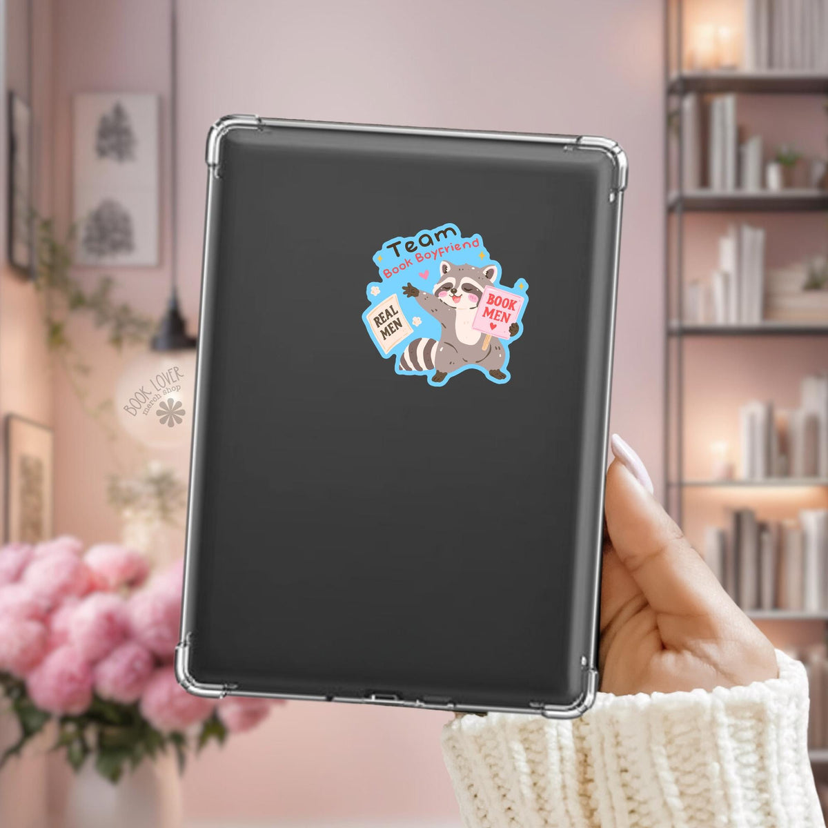 Team Book Boyfriend Raccoon Kindle sticker on desk, bookish decal
