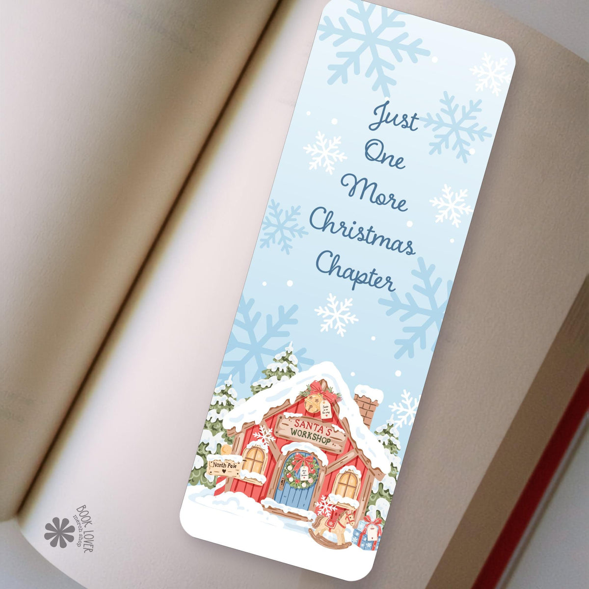 Christmas Chapter bookmark in an open book, cozy reading