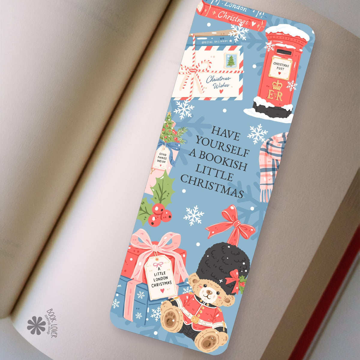 London Teddy Bear bookmark in an open book, cozy reading