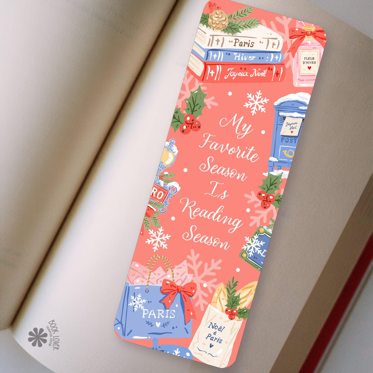 Paris Snow Reading bookmark in an open book, cozy reading