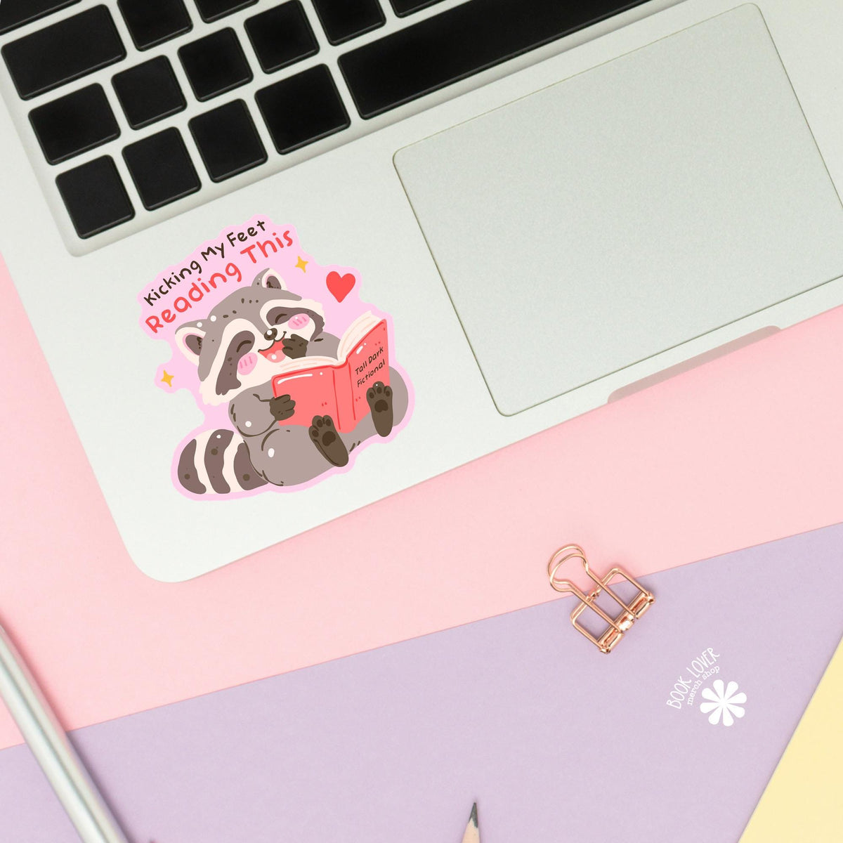 Raccoon Reading sticker close up, matte finish, book lover vinyl decal